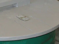Arkivbilde 10: Detalj av luke i lokket.